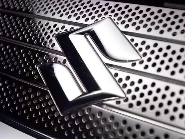 suzuki logo wallpaper,grille,automotive design,vehicle,automotive exterior,car