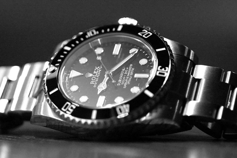 rolex watch wallpaper,watch,analog watch,watch accessory,black,fashion accessory