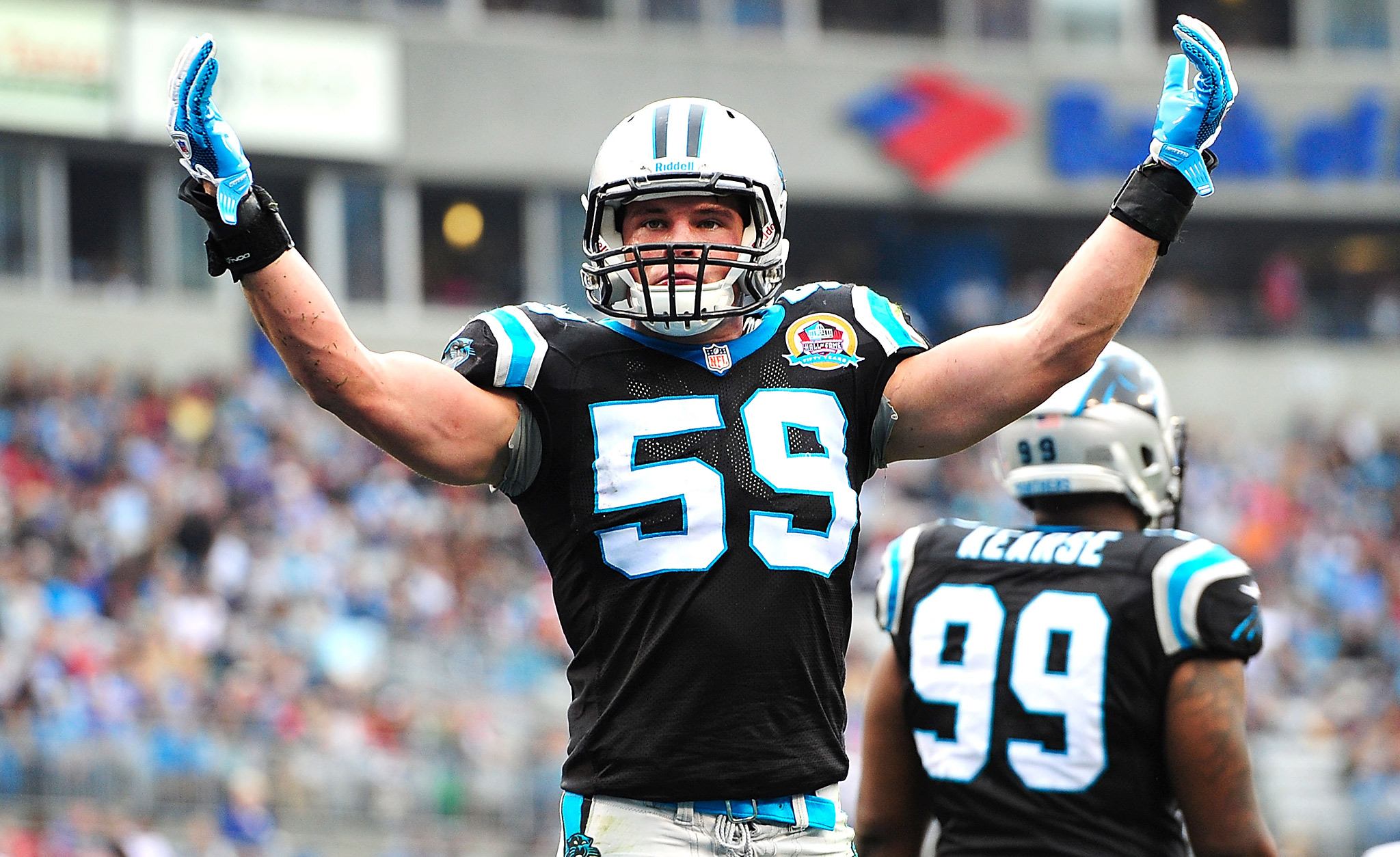 fond d'écran luke kuechly,joueur,équipement de sport,des sports,casque,équipement sportif