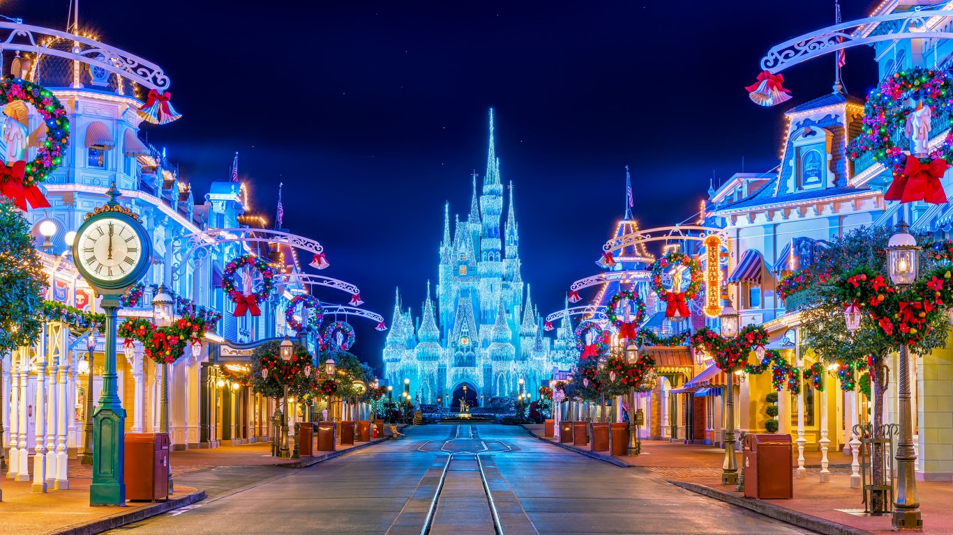 disney laptop wallpaper,landmark,night,amusement park,town,lighting