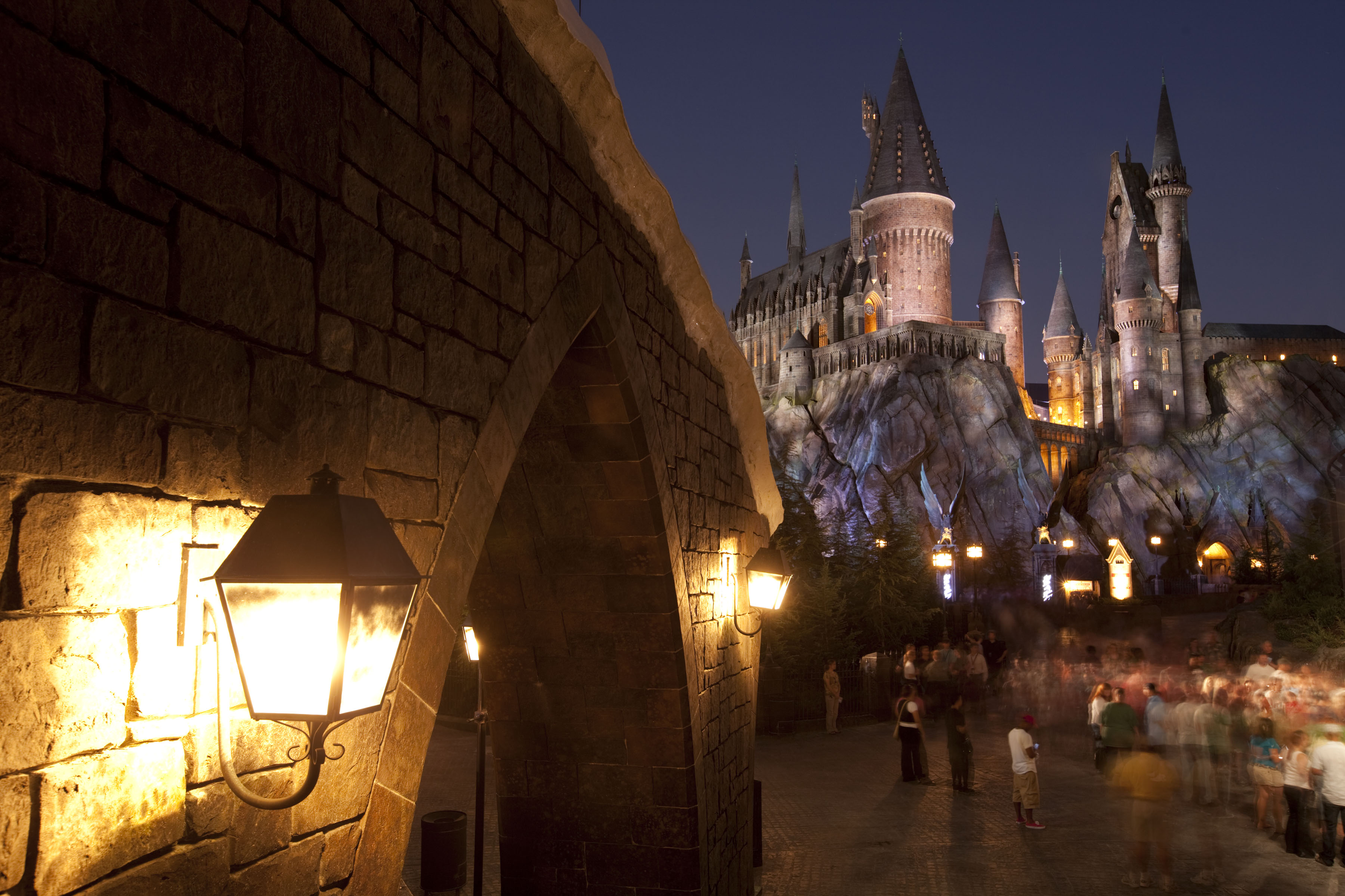 hogwarts desktop wallpaper,landmark,night,architecture,town,building