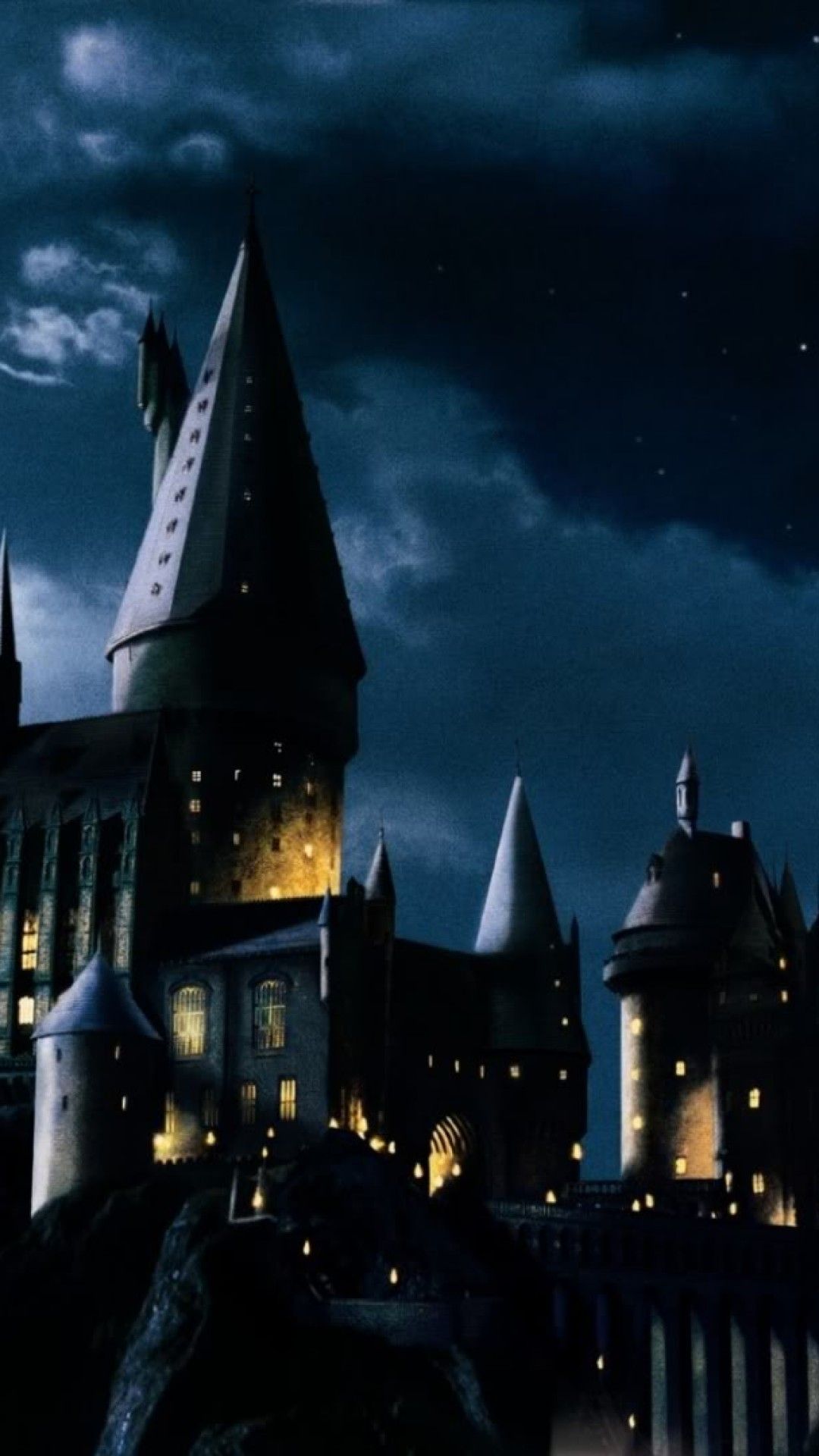 hogwarts iphone wallpaper,sky,landmark,night,town,midnight