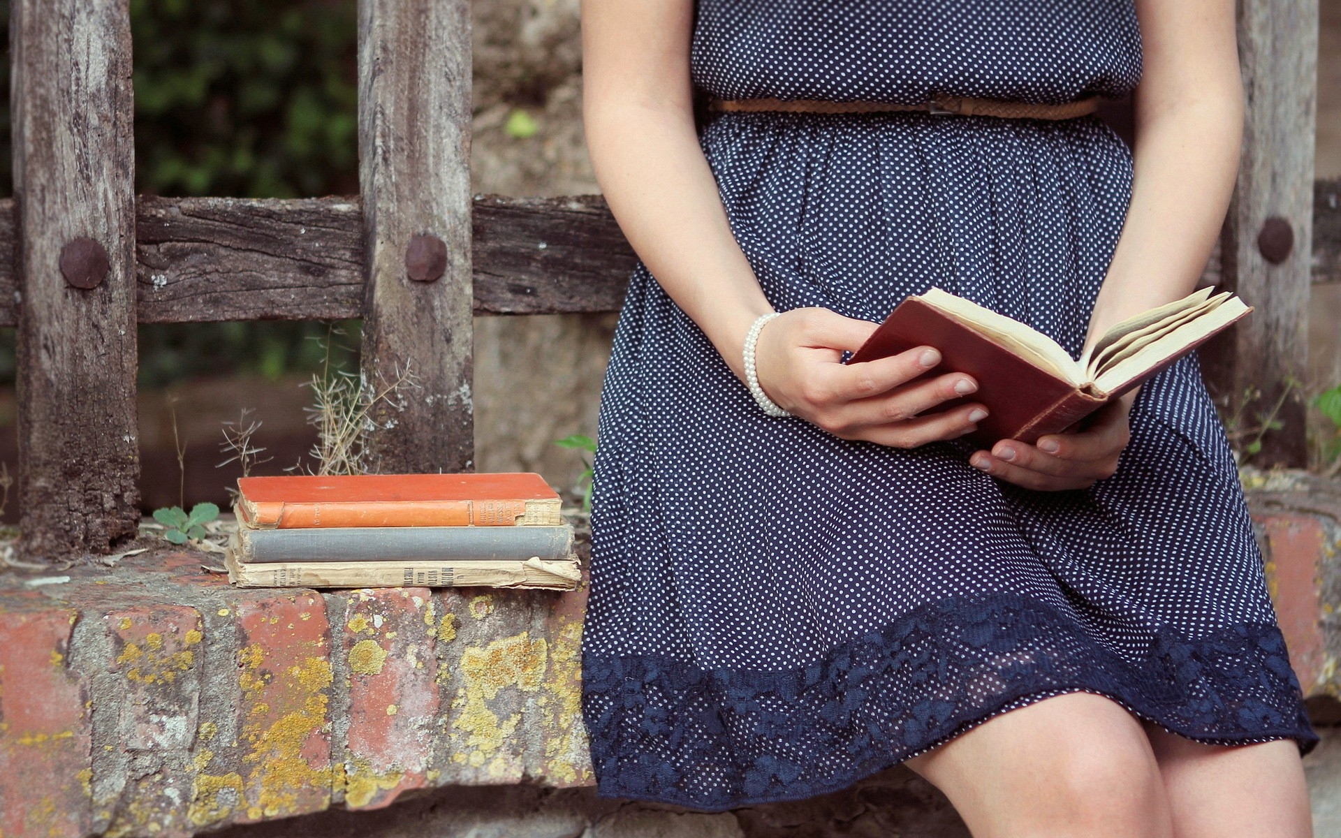 girl reading book wallpapers,clothing,waist,yellow,sitting,fashion