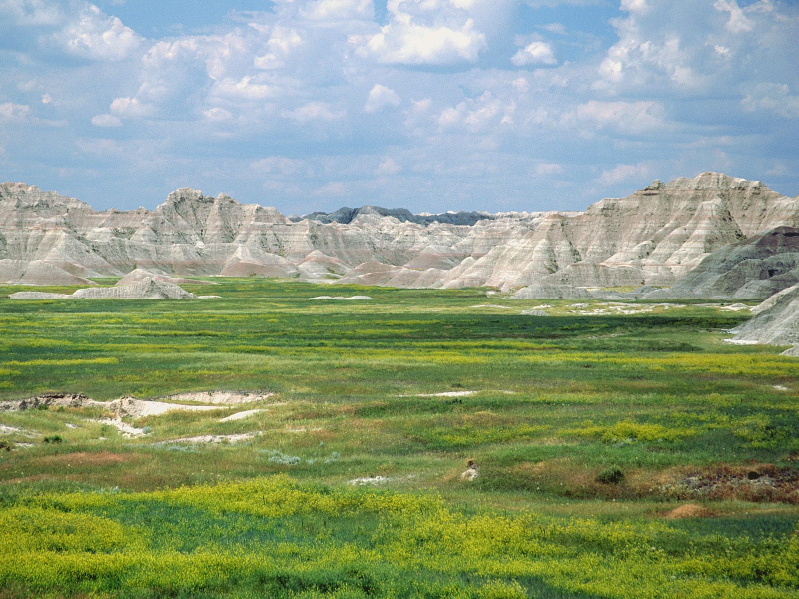 badlands wallpaper,mountainous landforms,grassland,natural landscape,badlands,natural environment