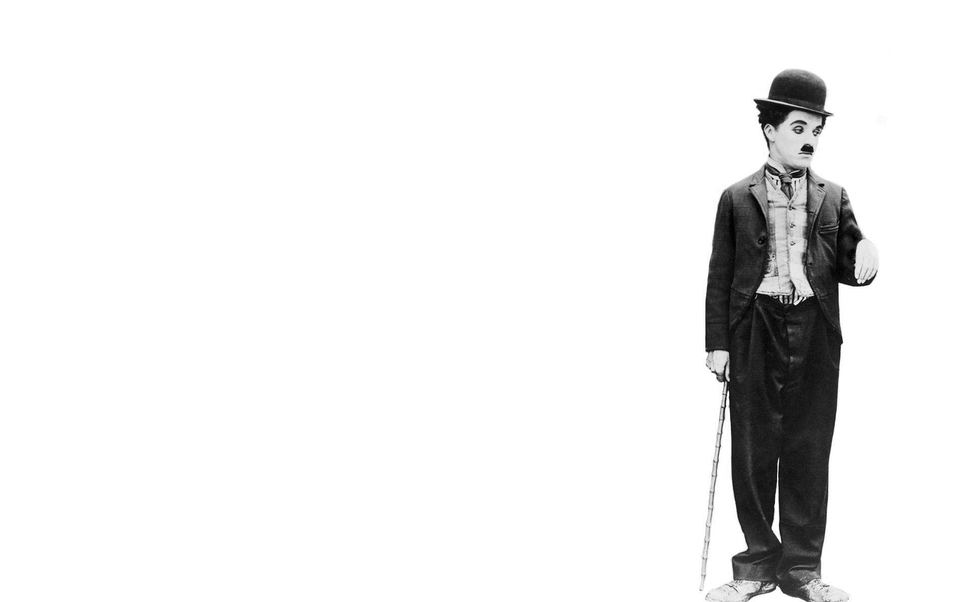 chaplin wallpaper,standing,suit,formal wear,fashion,black and white
