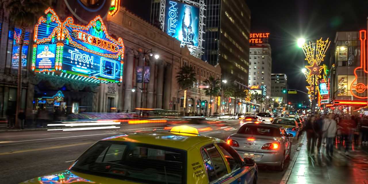 hollywood hero wallpaper,metropolitan area,metropolis,taxi,traffic,urban area