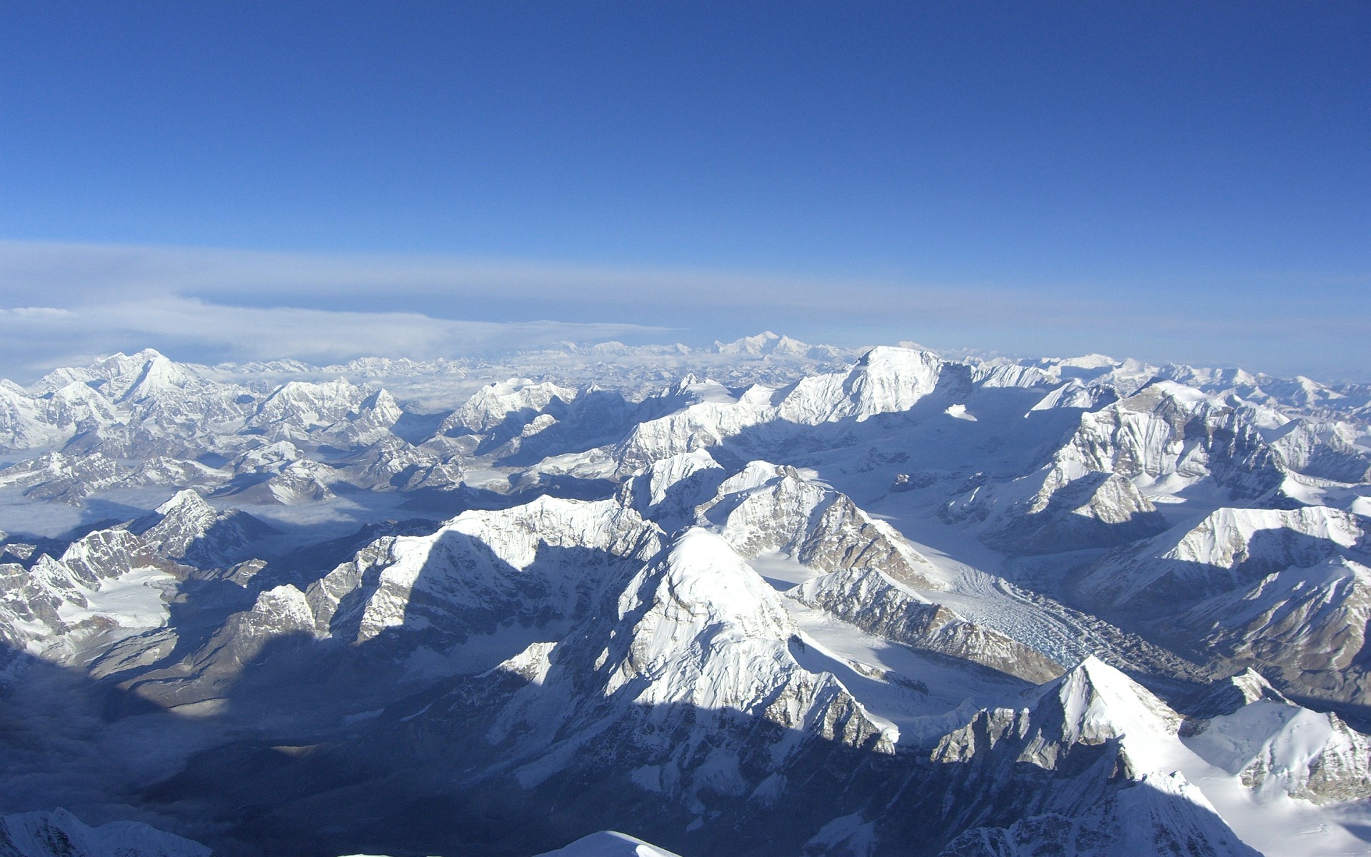 snowy wallpaper,mountainous landforms,mountain,mountain range,ridge,sky