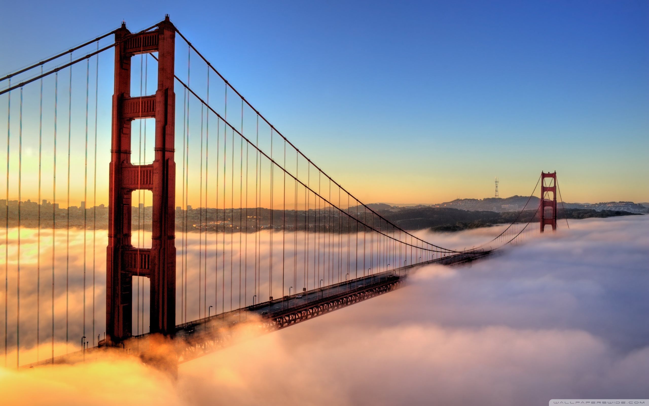 san francisco bridge wallpaper,sky,bridge,cable stayed bridge,water,suspension bridge