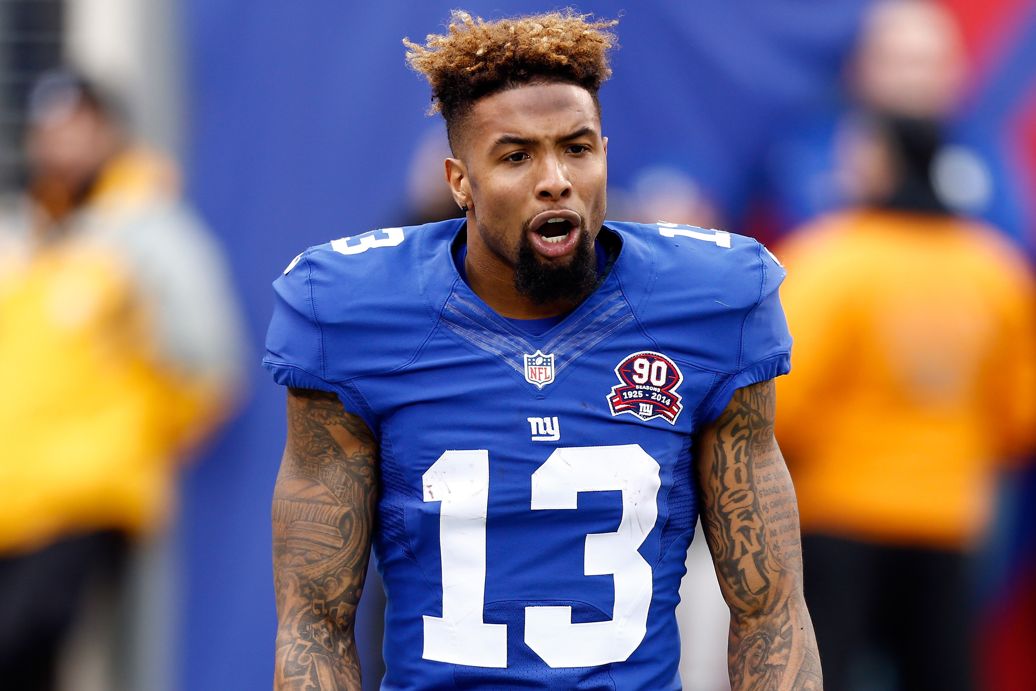 odell beckham jr wallpaper hd,player,facial expression,football player,team sport,product