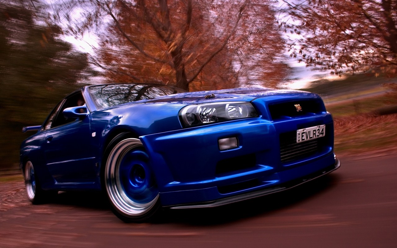 hd wallpaper nissan skyline r34,veicolo terrestre,veicolo,auto,auto sportiva,supercar