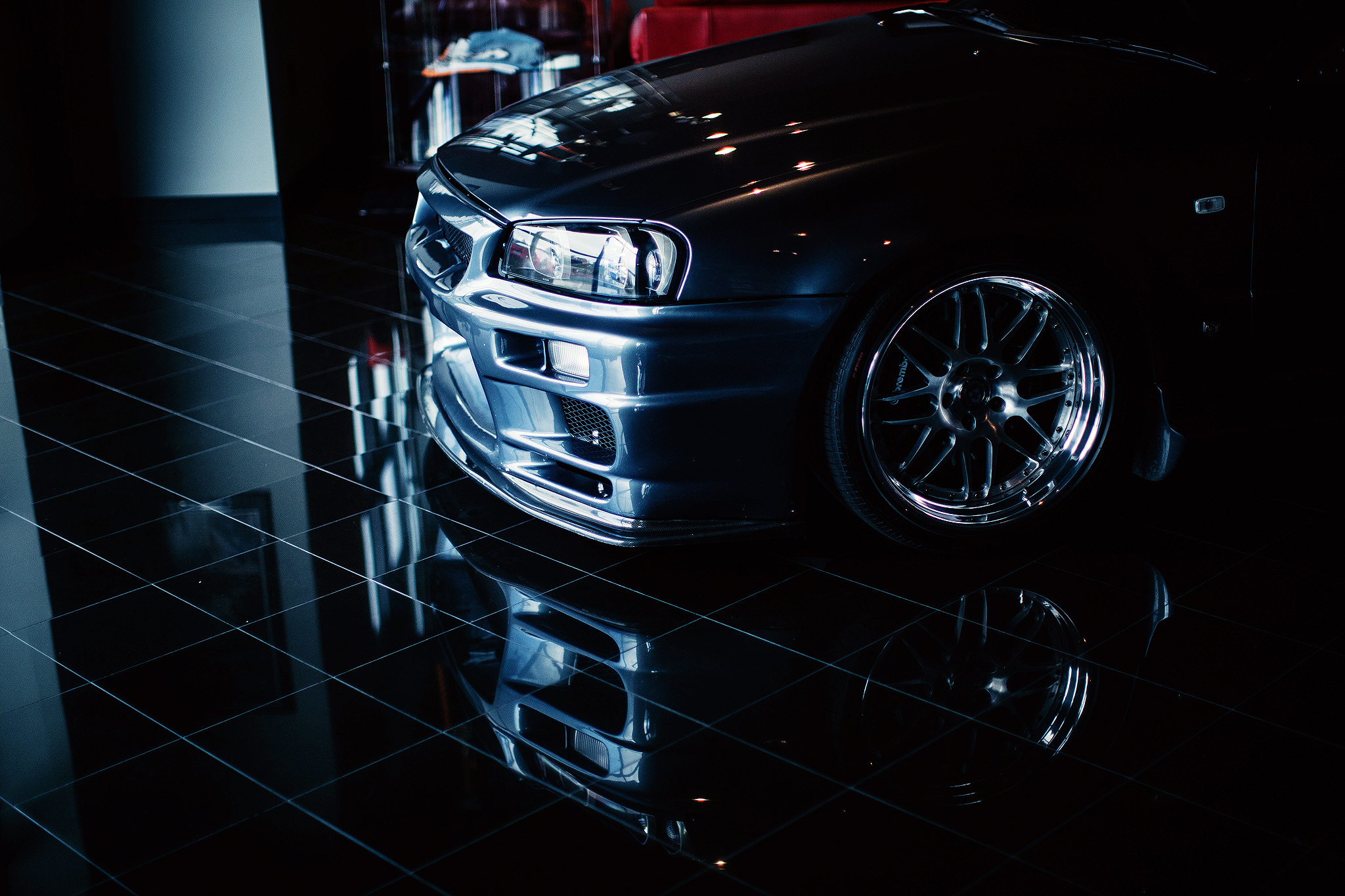 nissan skyline r34 wallpaper hd,land vehicle,vehicle,car,automotive design,headlamp