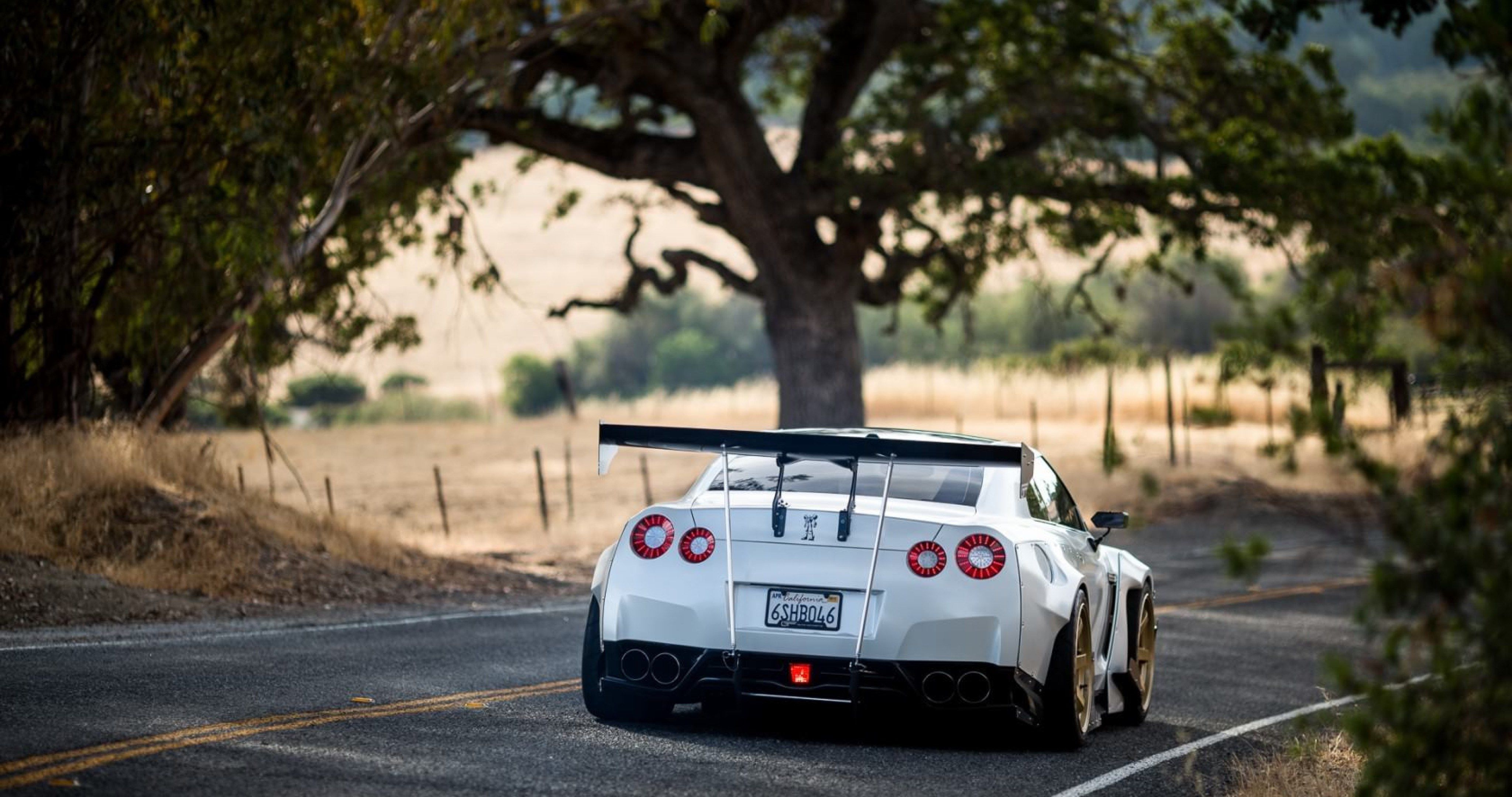 nissan gtr r35 wallpaper hd,veicolo terrestre,veicolo,auto,auto sportiva,supercar