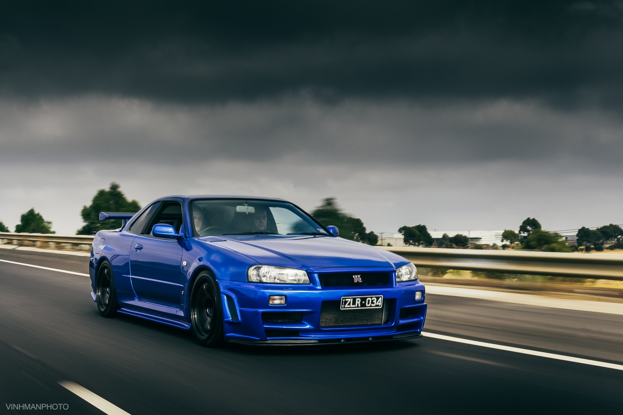 nissan gtr r34 wallpaper,land vehicle,vehicle,car,automotive design,performance car