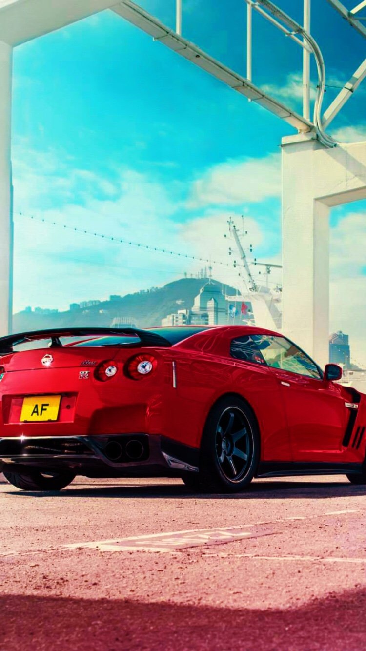 nissan gtr wallpaper iphone 6,land vehicle,vehicle,car,sports car,supercar