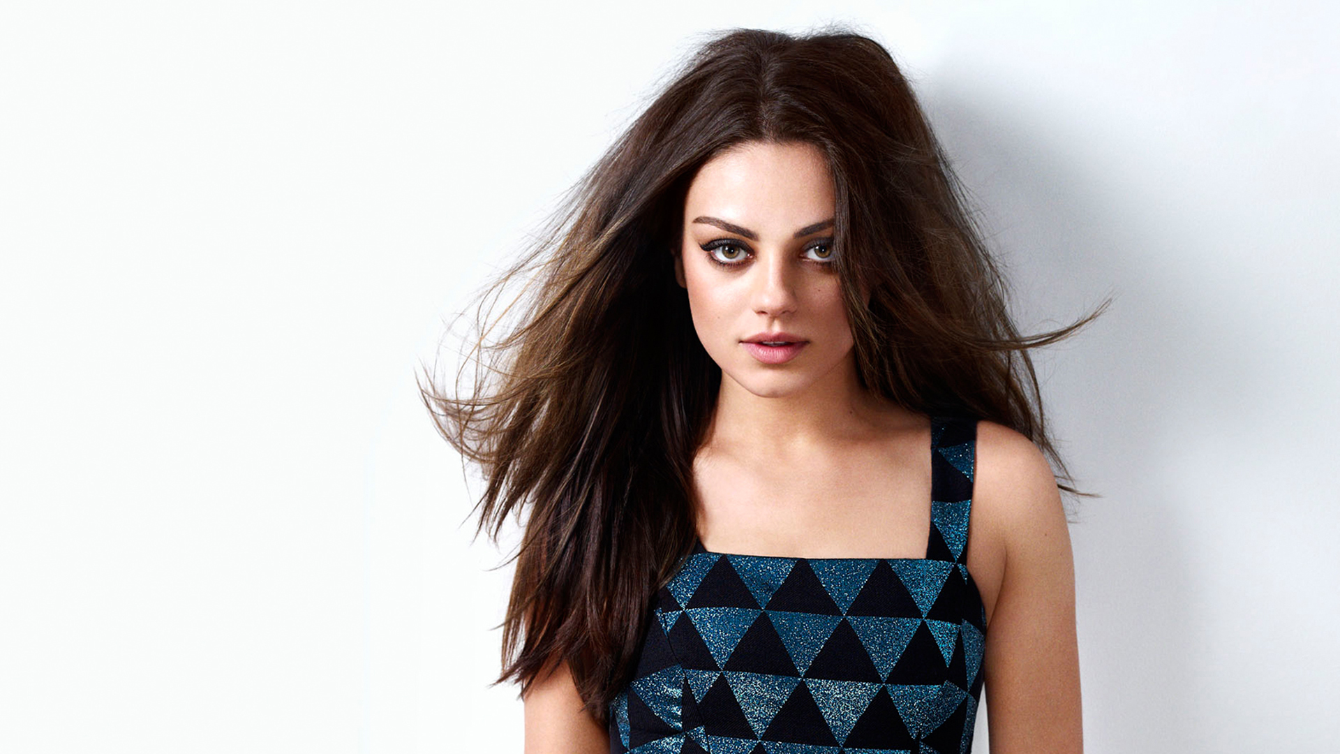 mila kunis wallpaper,hair,face,hairstyle,clothing,blue