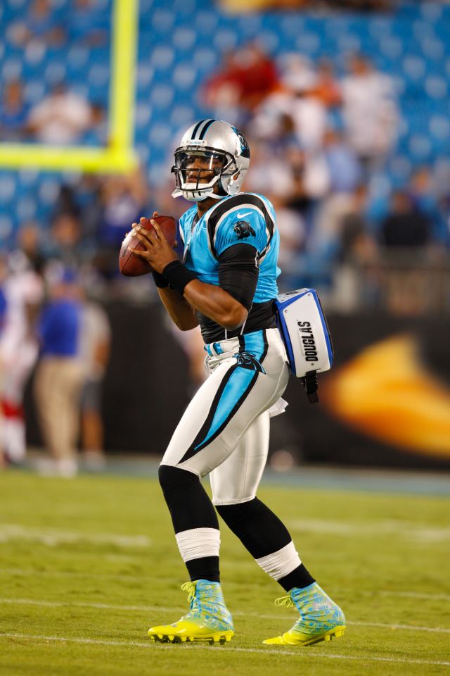 cam newton fondo de pantalla para iphone,jugador,engranaje de los deportes,yelmo,equipo deportivo,fútbol de gridiron