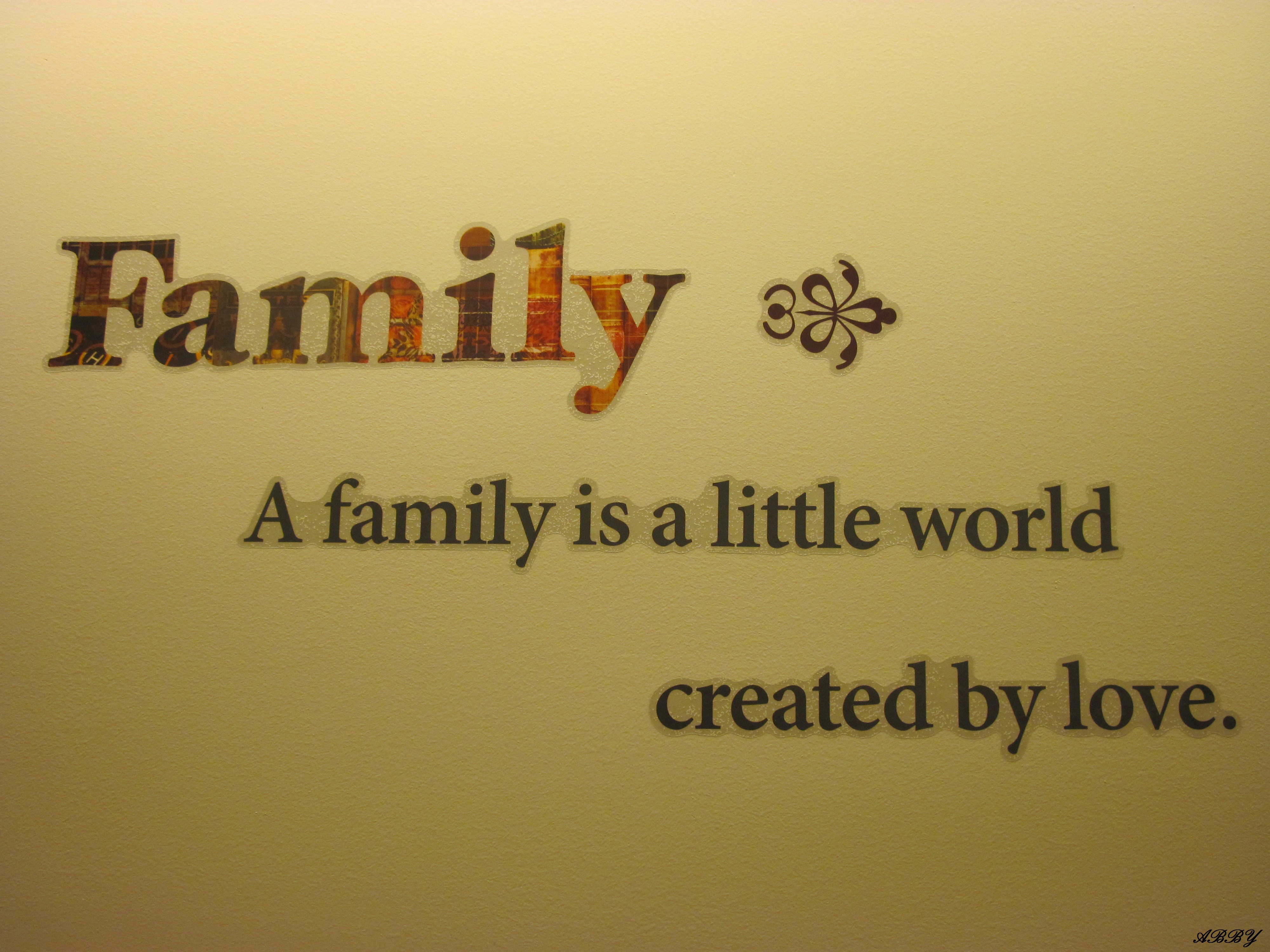 family photo wallpaper,text,font,wall,room,graphics