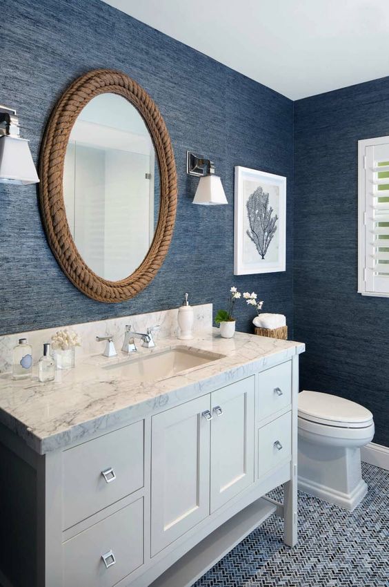 A Nautical Bathroom With Navy Textural Wallpaper, A Blue Powder Room