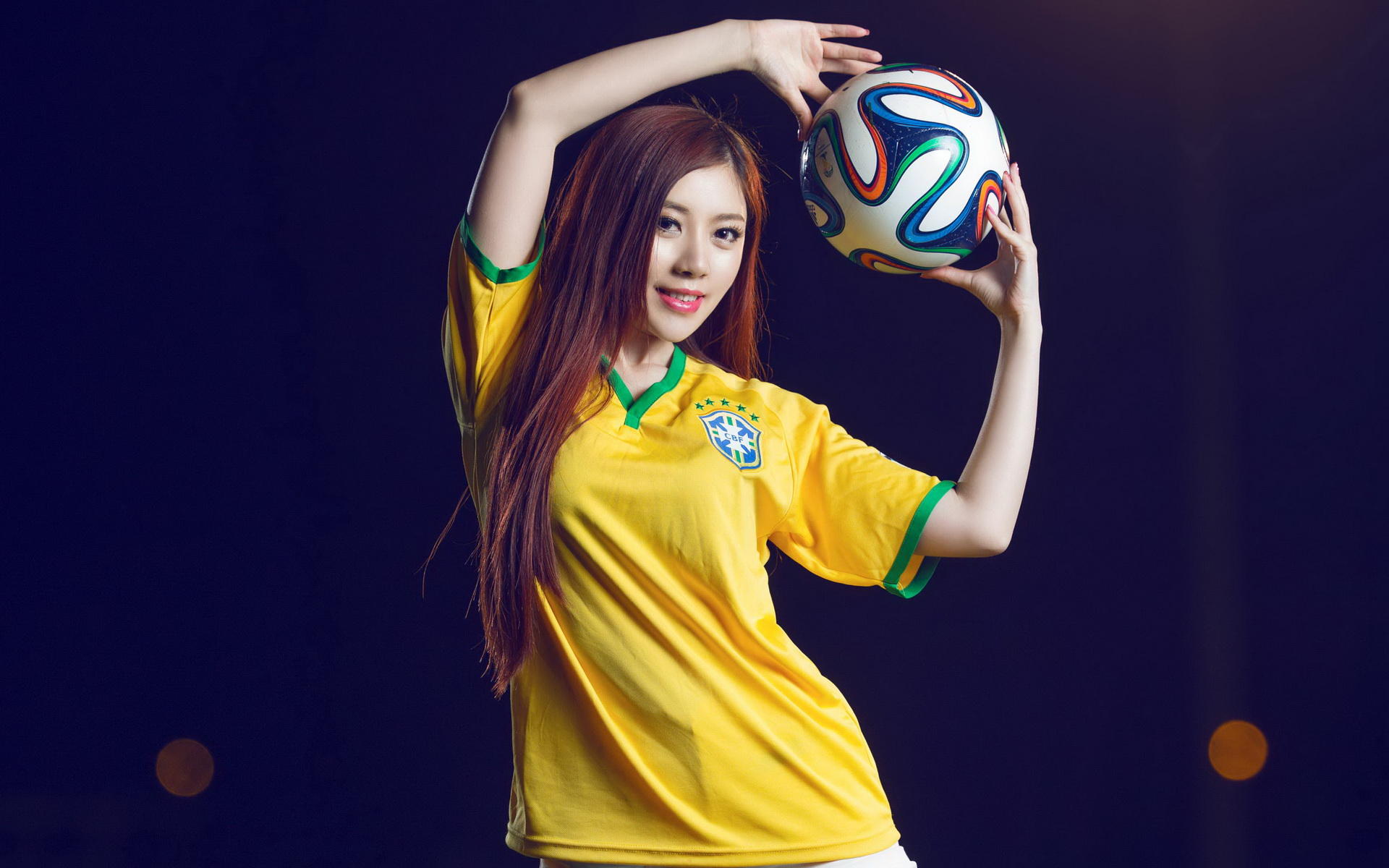 サッカー少女の壁紙,黄,プレーヤー,tシャツ,写真撮影,バレーボール選手