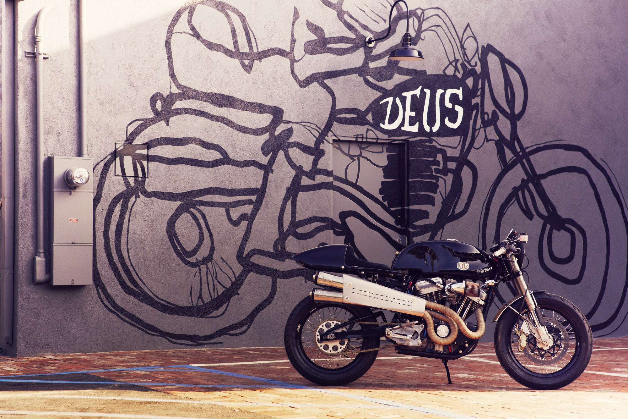 deus ex machina wallpaper,motor vehicle,motorcycle,vehicle,wall,street art