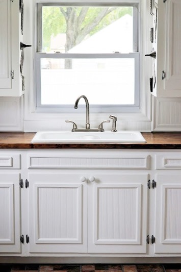 beadboard wallpaper cabinets,sink,countertop,room,cabinetry,furniture