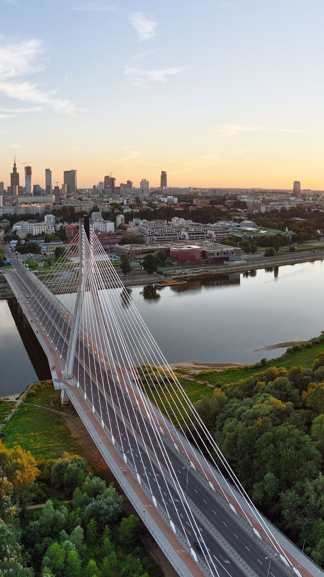 fondo de pantalla de varsovia,puente suspendido en cables,puente,paisaje urbano,área metropolitana,paso superior