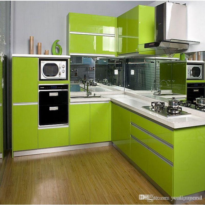 cupboard wallpaper,cabinetry,major appliance,kitchen,countertop,room