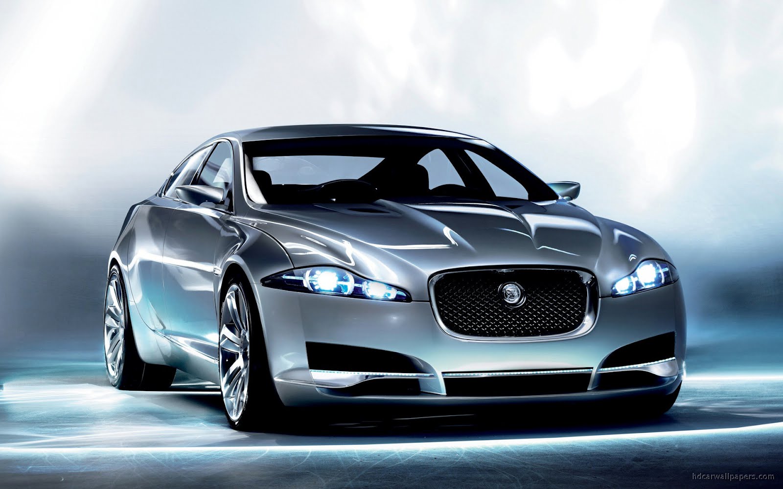 jaguar car wallpaper,land vehicle,luxury vehicle,car,automotive design,vehicle