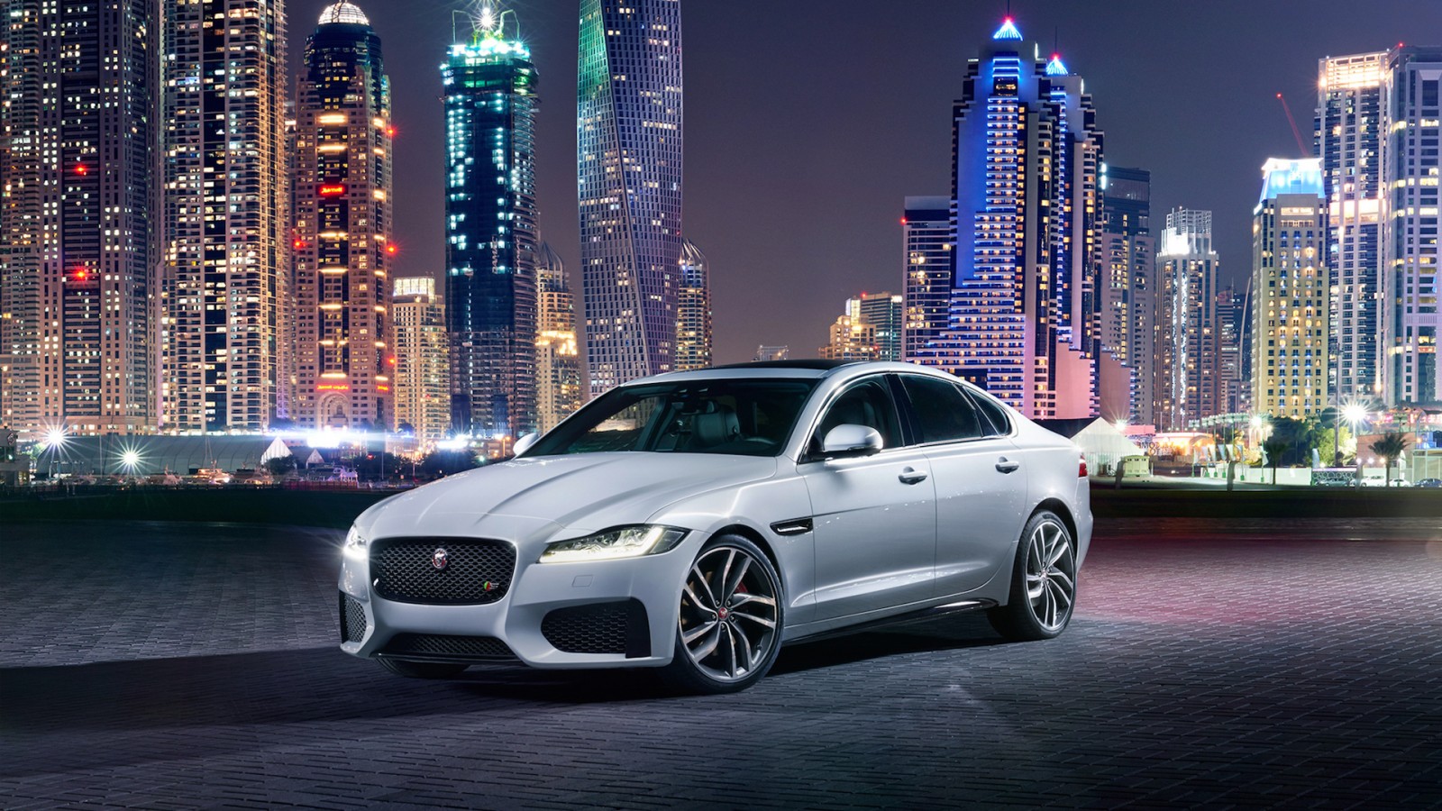 jaguar car wallpaper,land vehicle,car,luxury vehicle,vehicle,automotive design