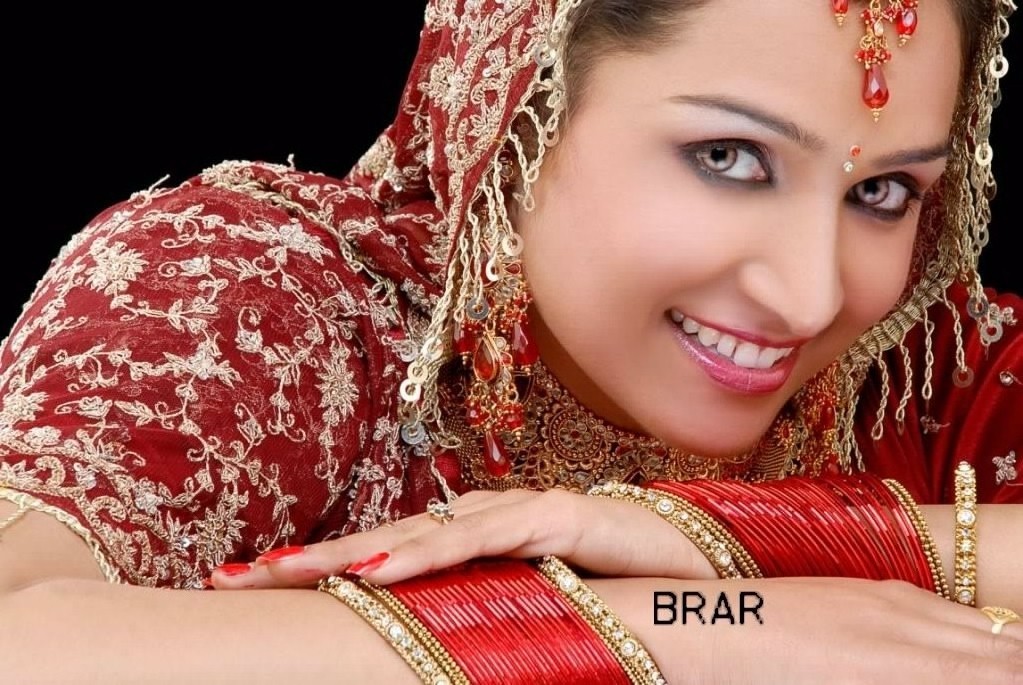 punjabi female models wallpapers,red,beauty,maroon,skin,pattern