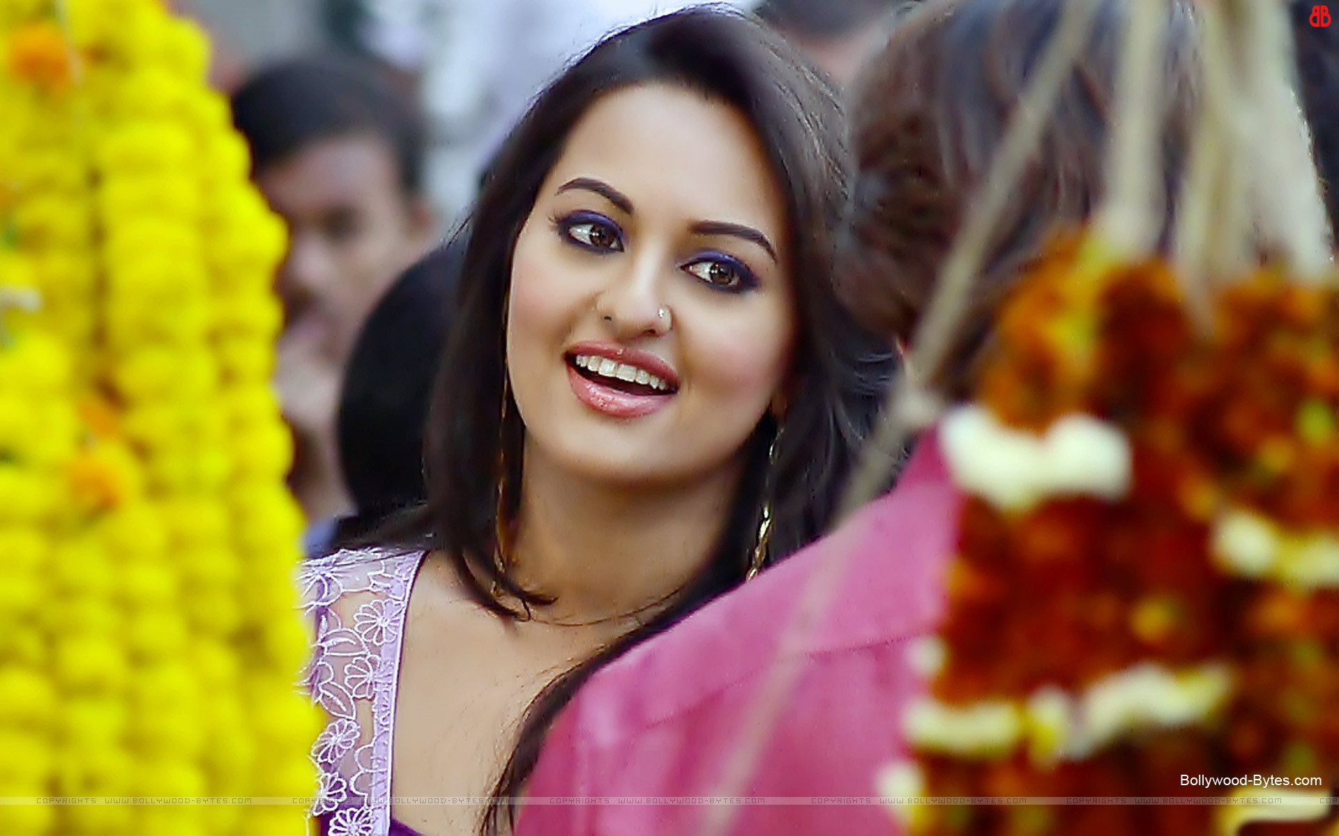 sonakshi sinha ke wallpaper,yellow,beauty,hairstyle,smile,long hair