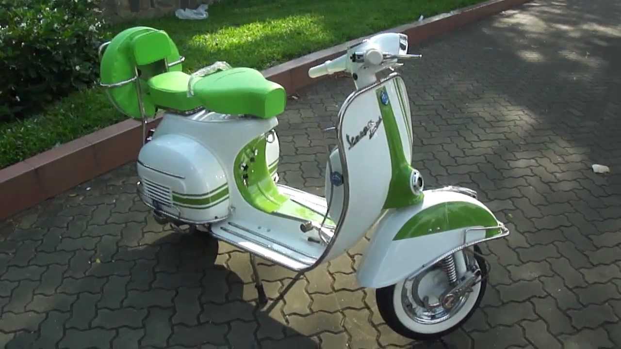 carta da parati vespa classica,scooter,veicolo a motore,vespa,verde,veicolo