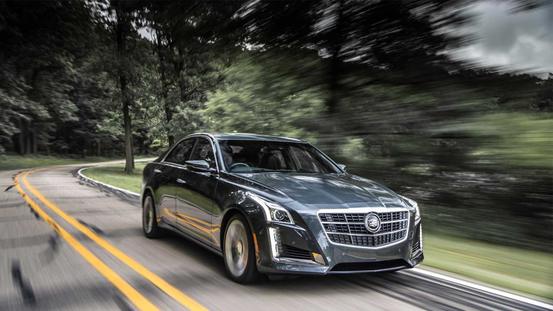 cadillac wallpaper,land vehicle,vehicle,car,luxury vehicle,automotive design