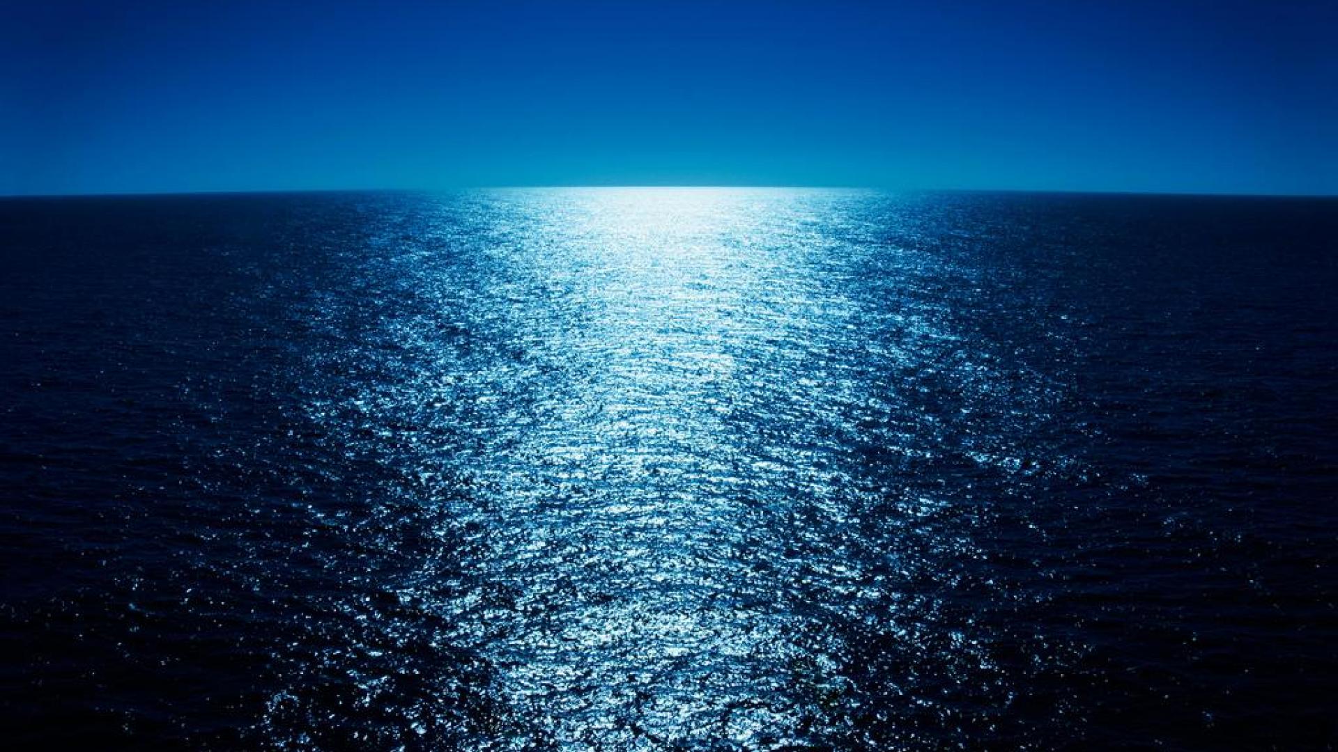 reflective wallpaper,sky,blue,horizon,water,sea