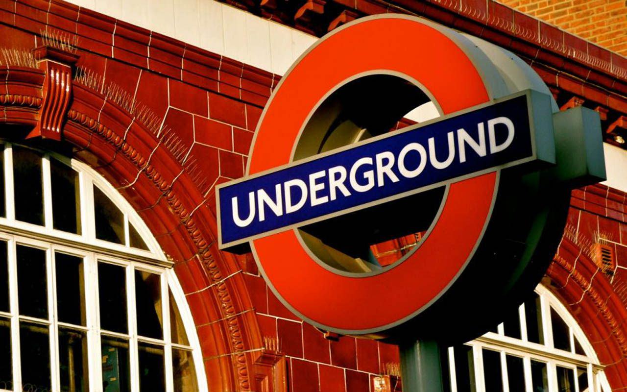 london underground wallpaper,signage,brick,building,architecture,sign