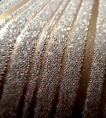 beaded wallpaper,close up,brown,textile,wood,fur