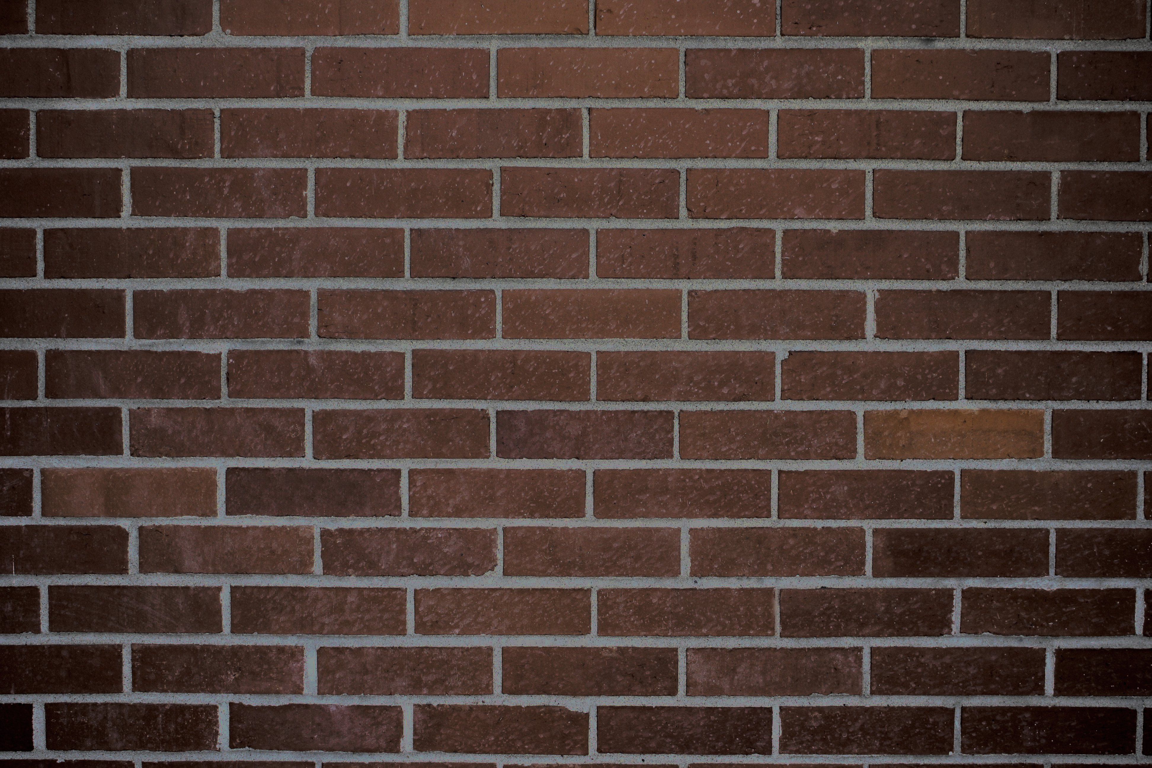 brown brick wallpaper,brickwork,brick,wall,composite material,symmetry