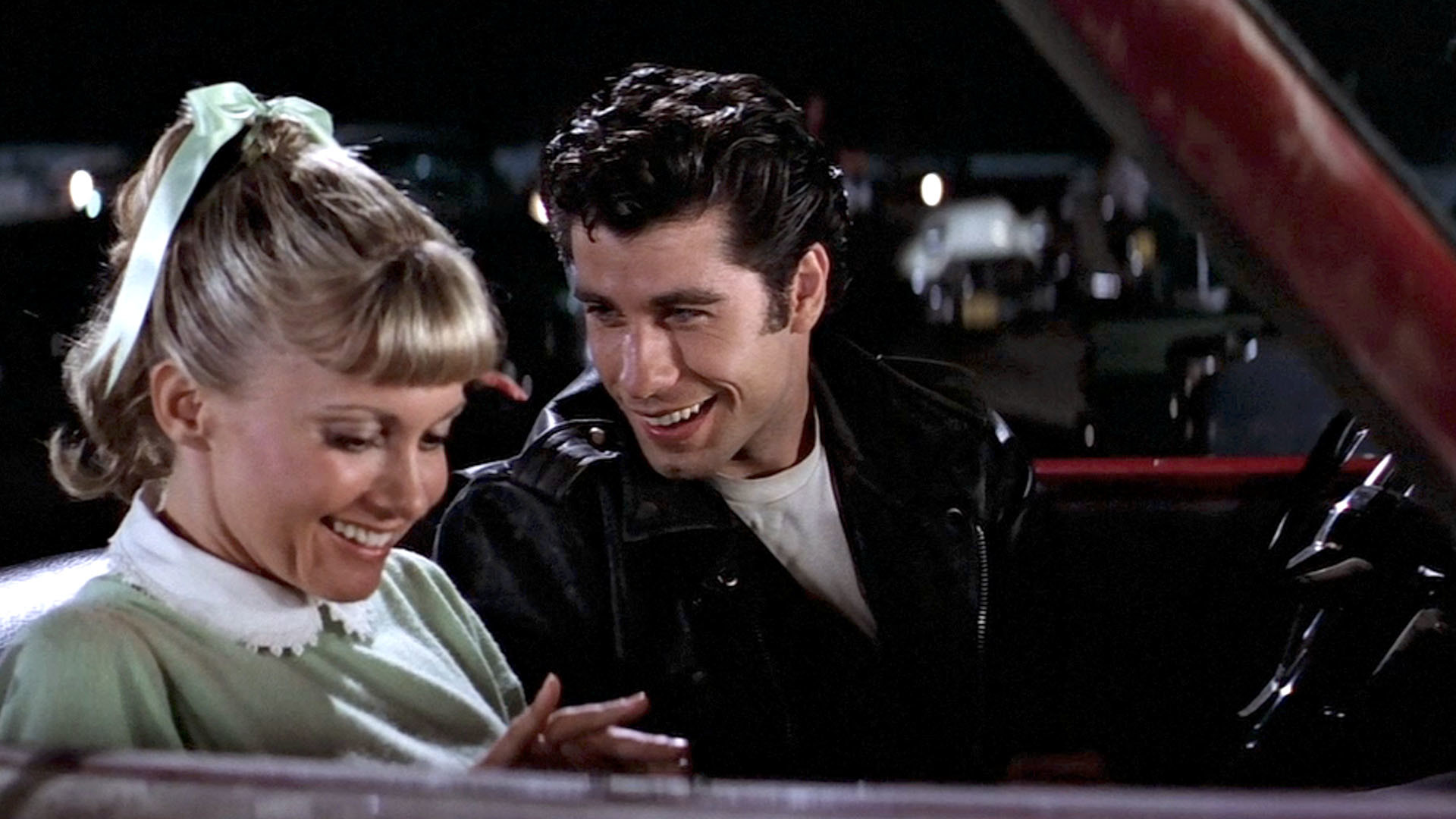 grease wallpaper,luxury vehicle,movie,smile,fictional character,vehicle