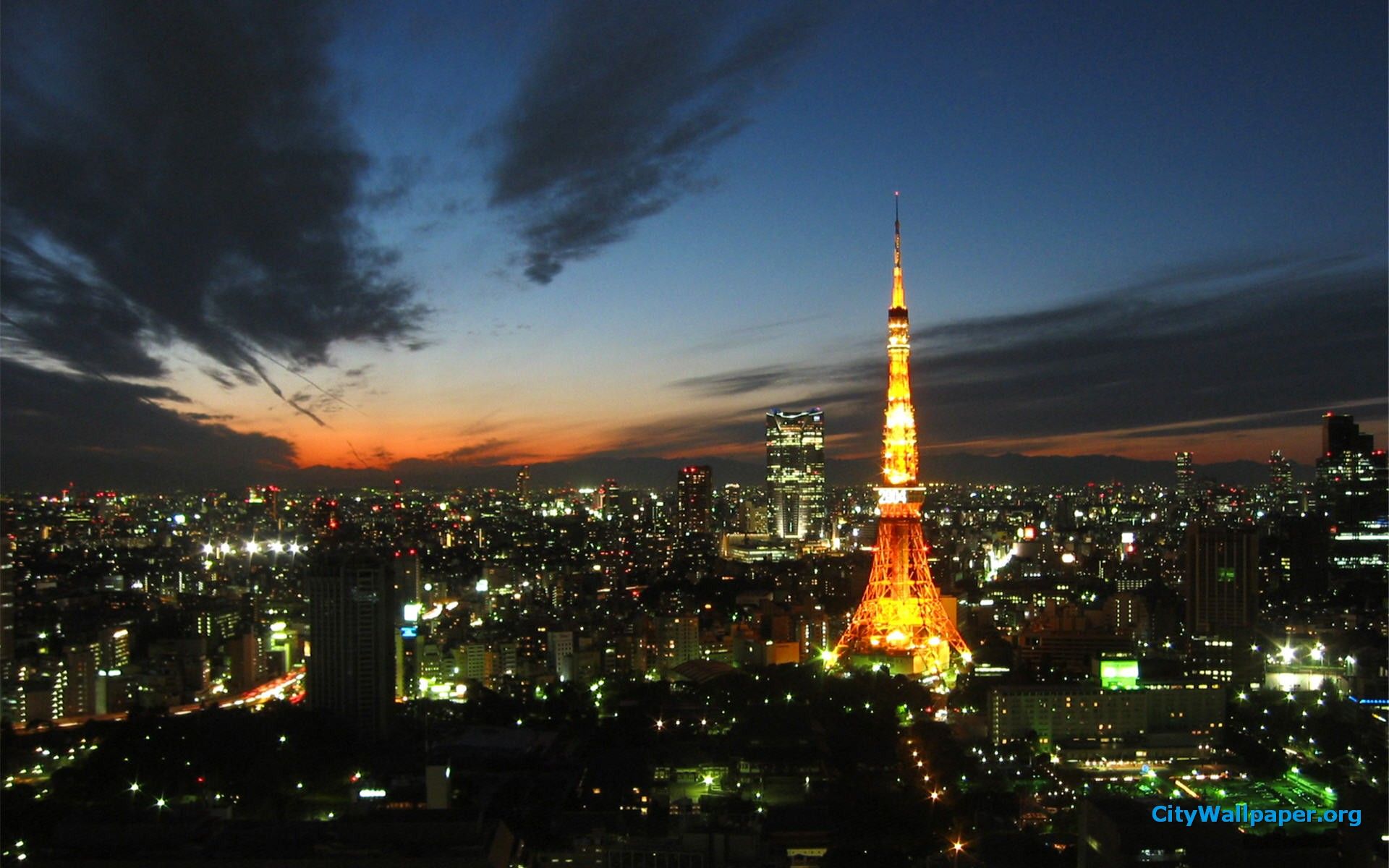 fond d'écran de la tour de tokyo,zone métropolitaine,paysage urbain,ville,ciel,zone urbaine