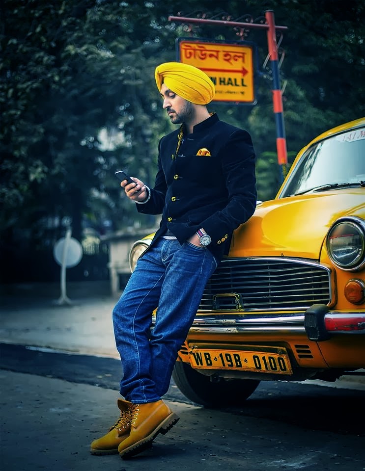 diljit dosanjh fondo de pantalla,amarillo,vehículo,coche,sombrerería,ropa de calle