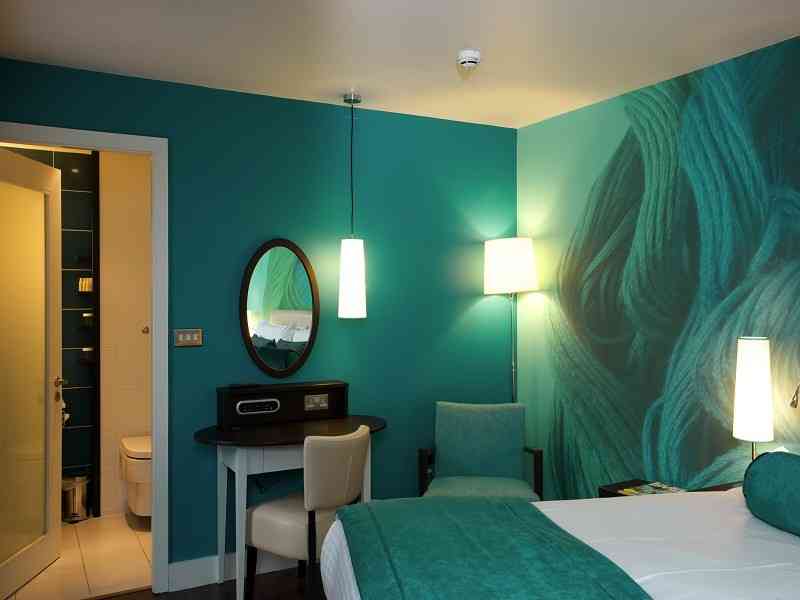 teal bedroom wallpaper,room,bedroom,property,interior design,furniture