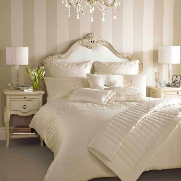 cream bedroom wallpaper,bedroom,bed,furniture,bed sheet,bedding