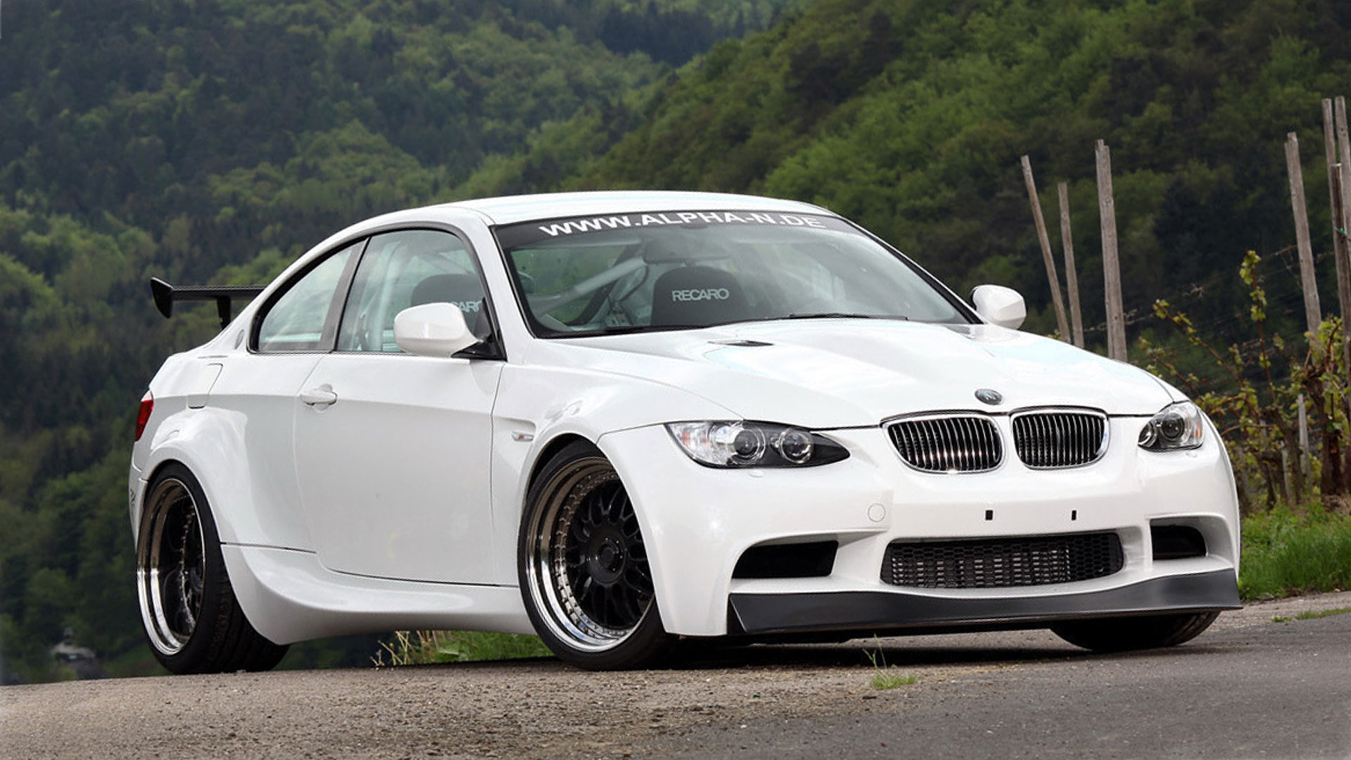 bmw 335i wallpaper,land vehicle,vehicle,car,motor vehicle,alloy wheel