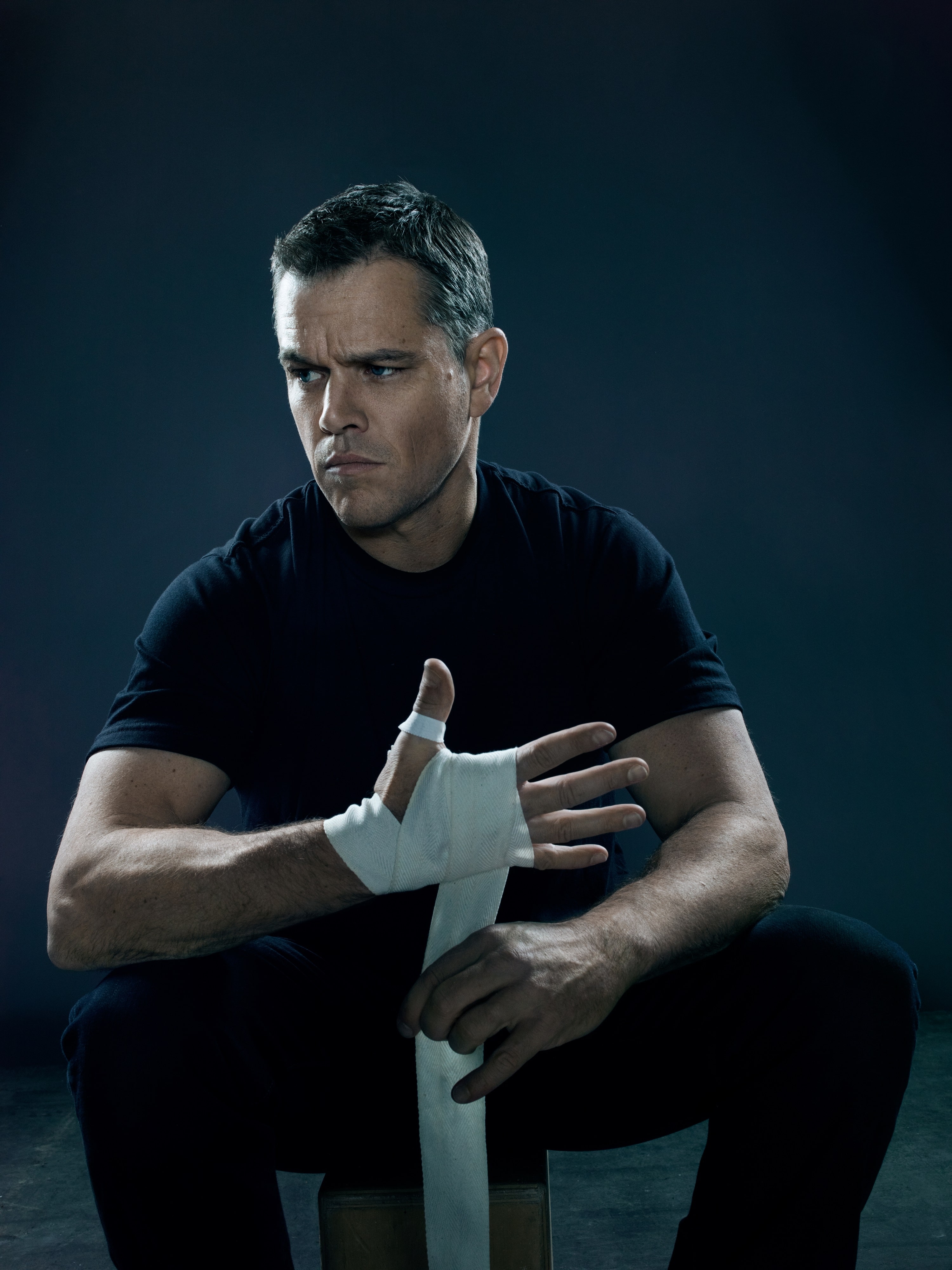 jason bourne wallpaper,sitting,muscle,hand,photography