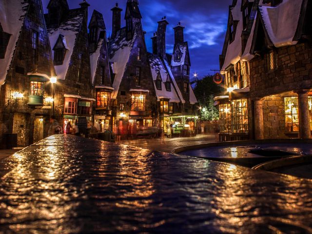 universal studios wallpaper,town,sky,night,landmark,waterway