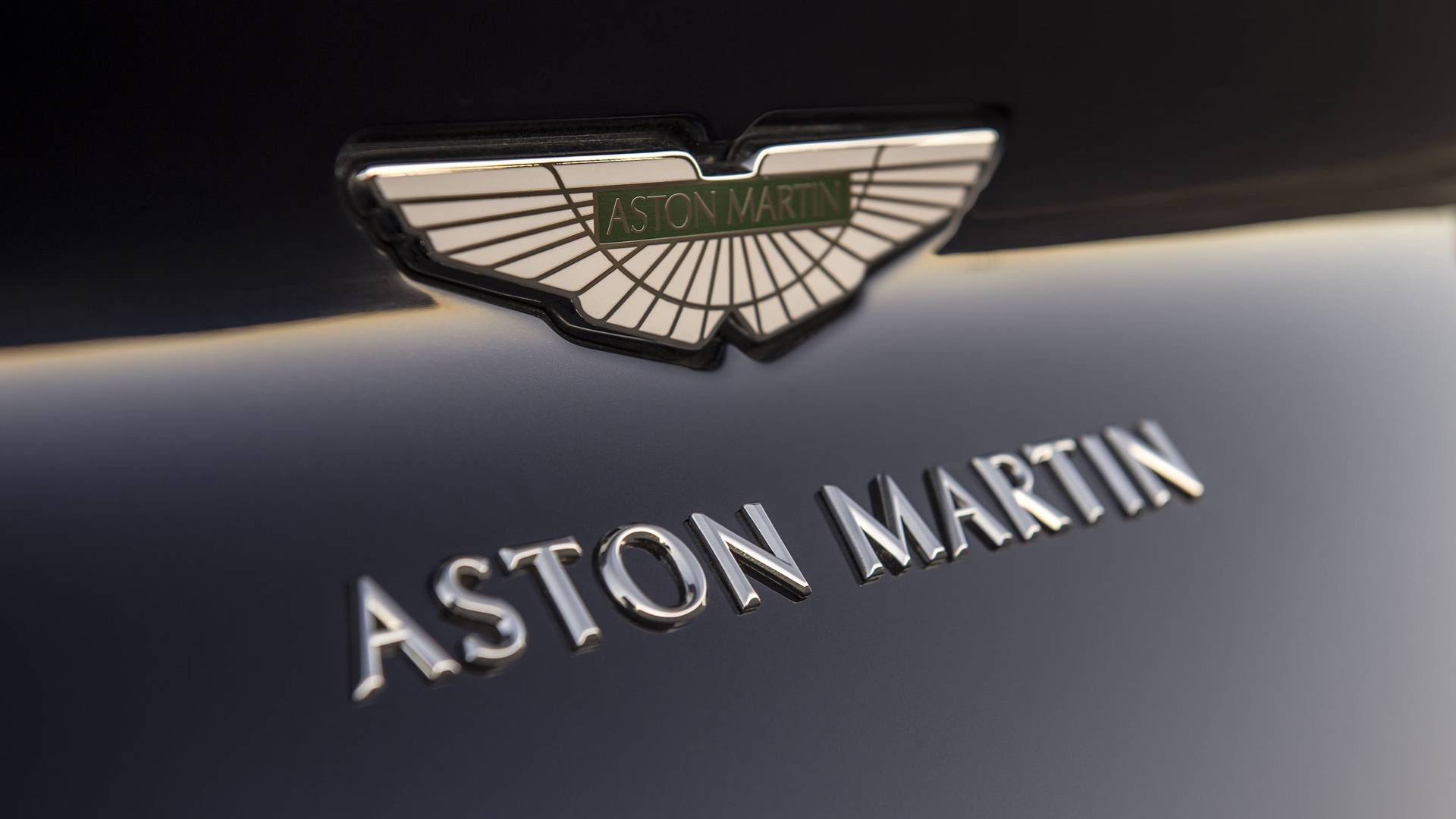 aston martin logo wallpaper,fahrzeug,auto,emblem,bentley,grafik