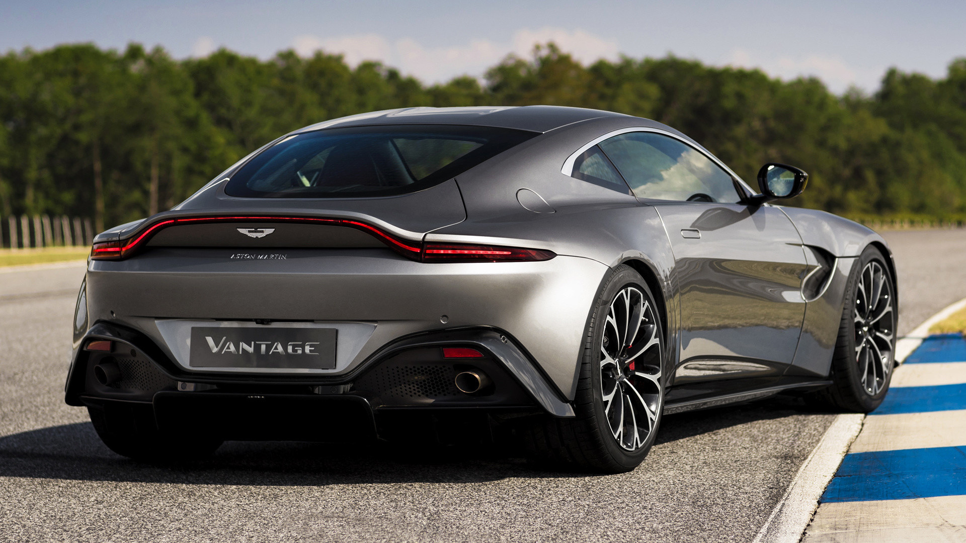 aston martin vanquish wallpaper,land vehicle,vehicle,car,automotive design,sports car