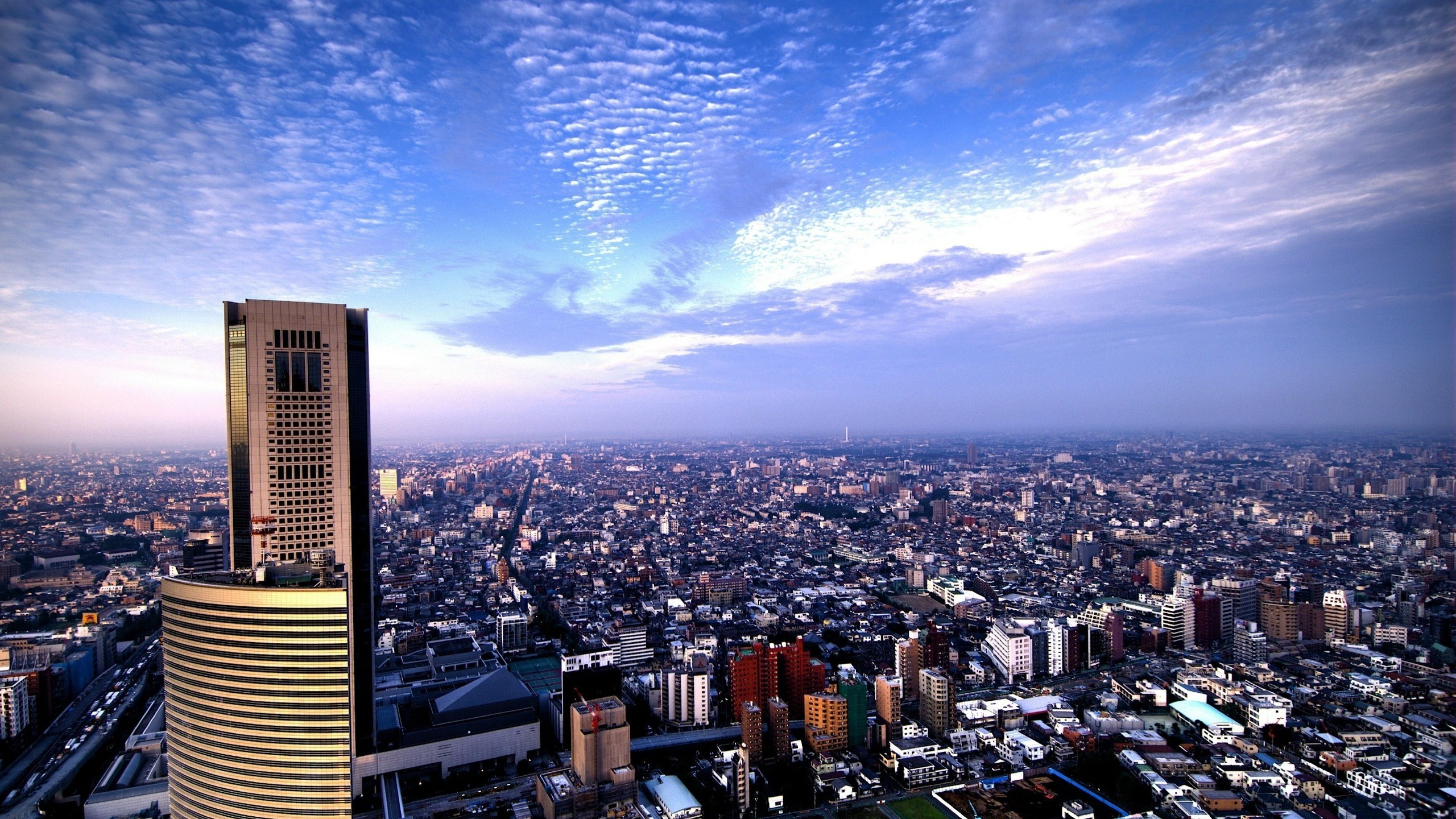 fond d'écran tokyo 4k,paysage urbain,ville,zone métropolitaine,zone urbaine,gratte ciel