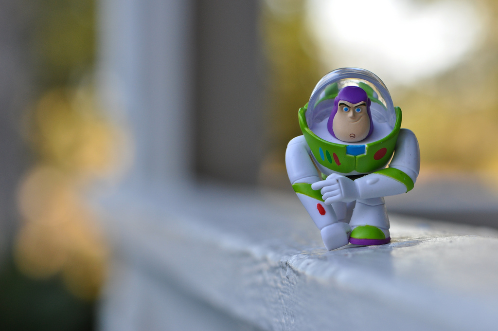 buzz lightyear wallpaper,figurine,toy,action figure,outerwear,photography