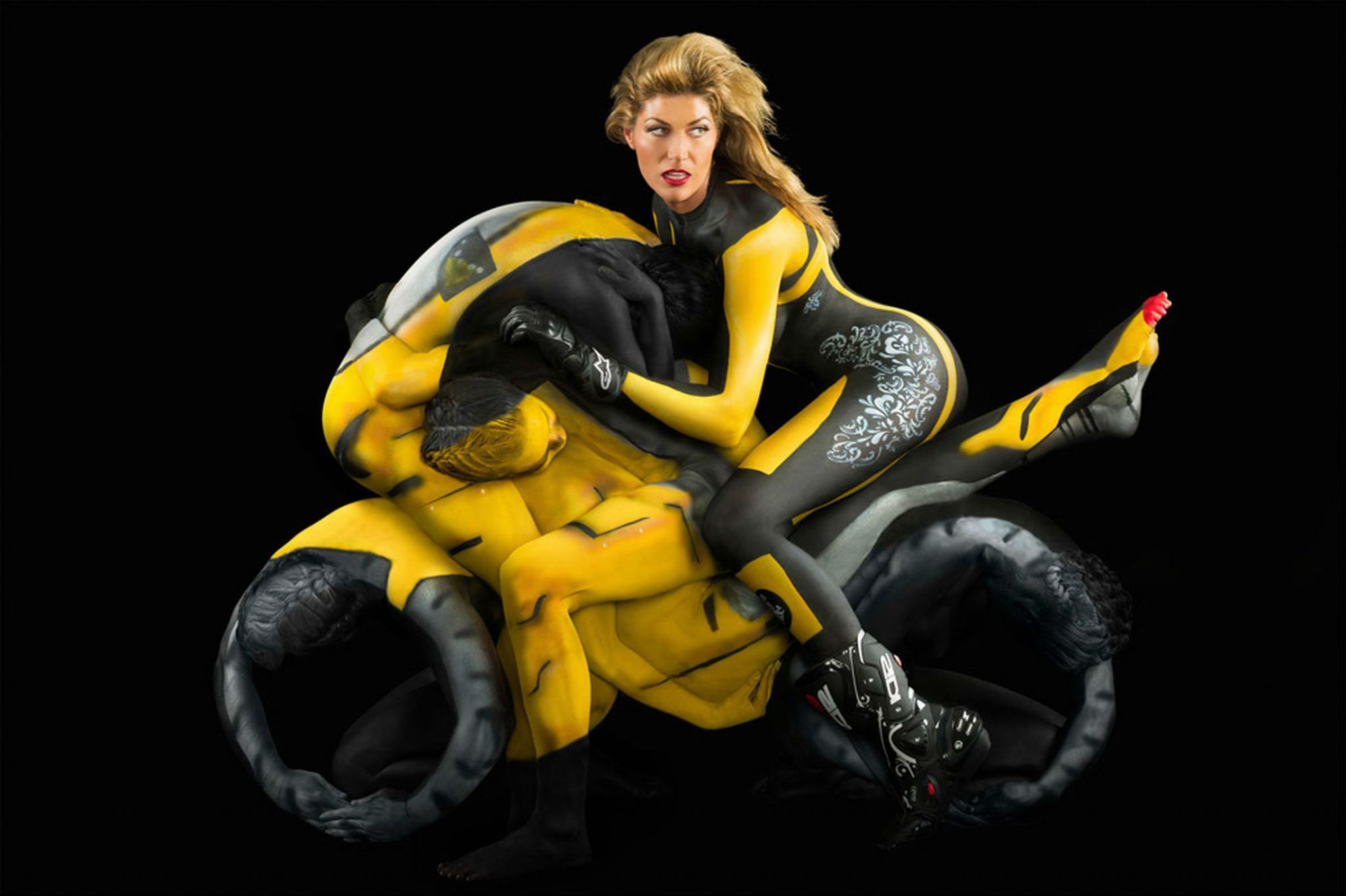 body paint wallpaper,yellow,figurine,sitting,fictional character,python